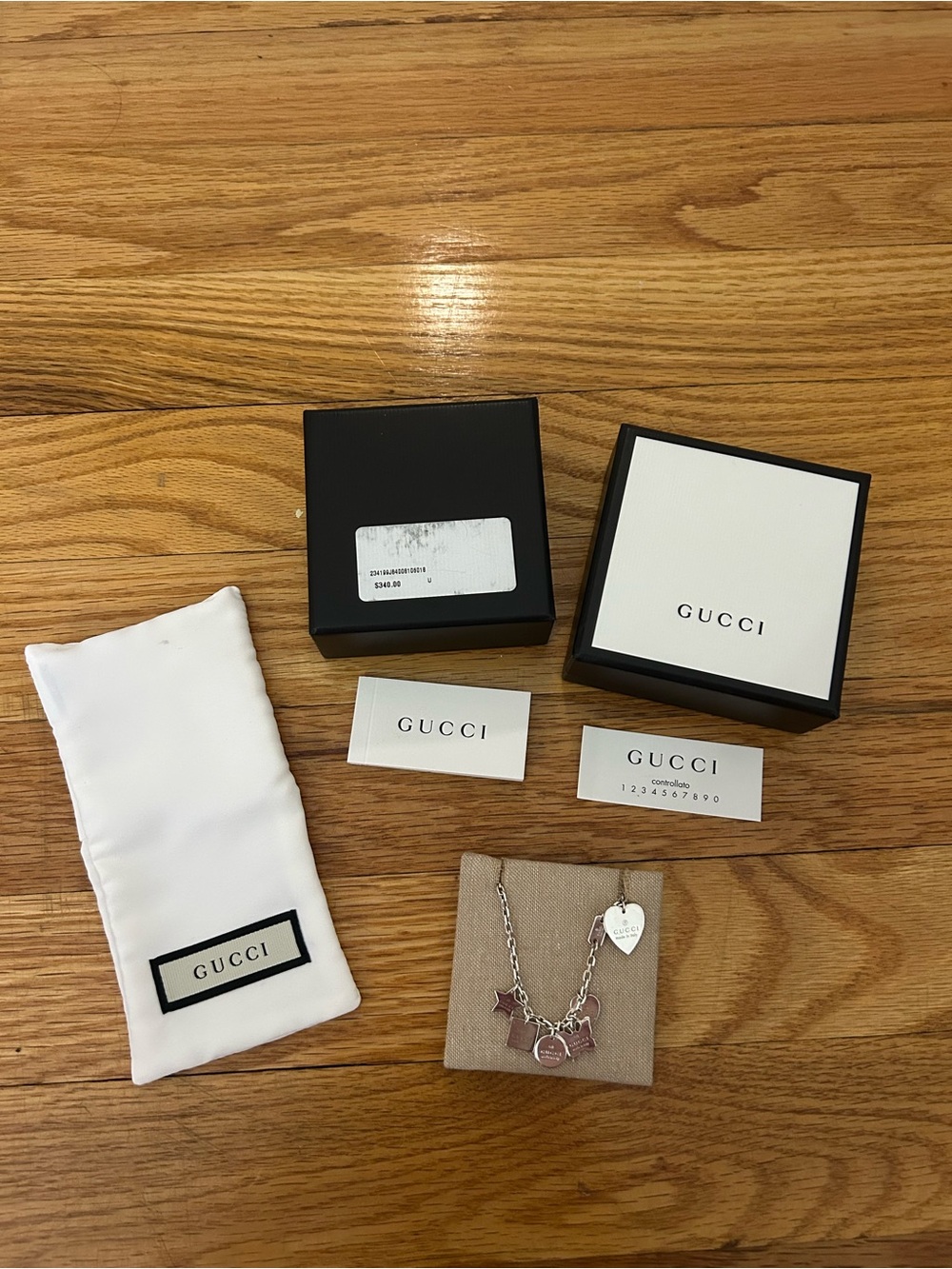 Gucci Silver Tone Heart & Charm Bracelet with Box